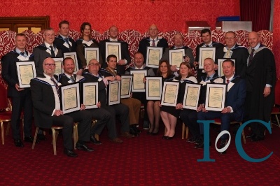 2020-news-feb-gowning-new-fellows-seated-formal